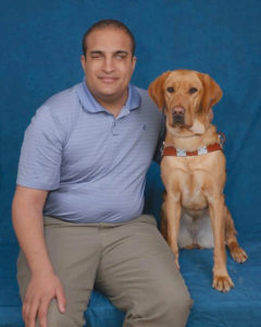 Christopher O'Meally with his Guiding Eyes for the Blind trained guide dog, Eden.