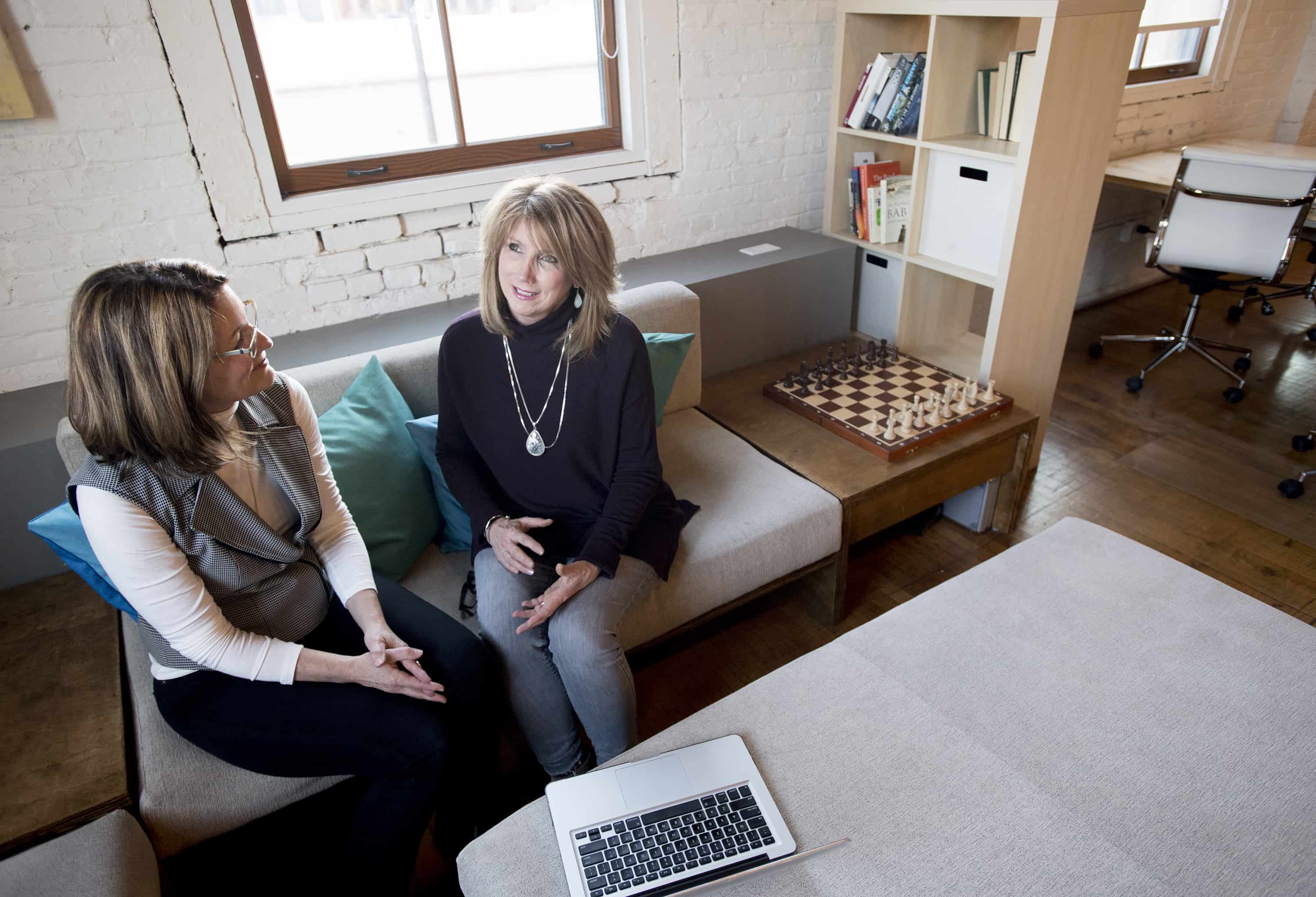 Judy Cornish, left, and Debby Dodds chat about a workshop they are co-teaching on "Dementia with Dignity: Using an iPad and Music to Manage Mood" on Wednesday, Jan. 10, 2018, in Spokane, Wash. (Tyler Tjomsland/The Spokesman-Review/TNS)