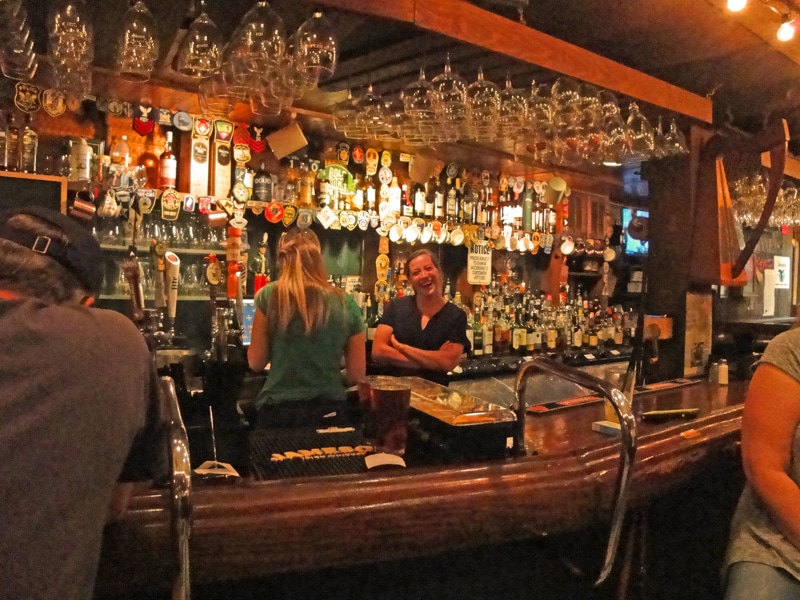 Kelsey Short tending bar at Rare Olde Times II, a favorite among the RVA bar hangouts