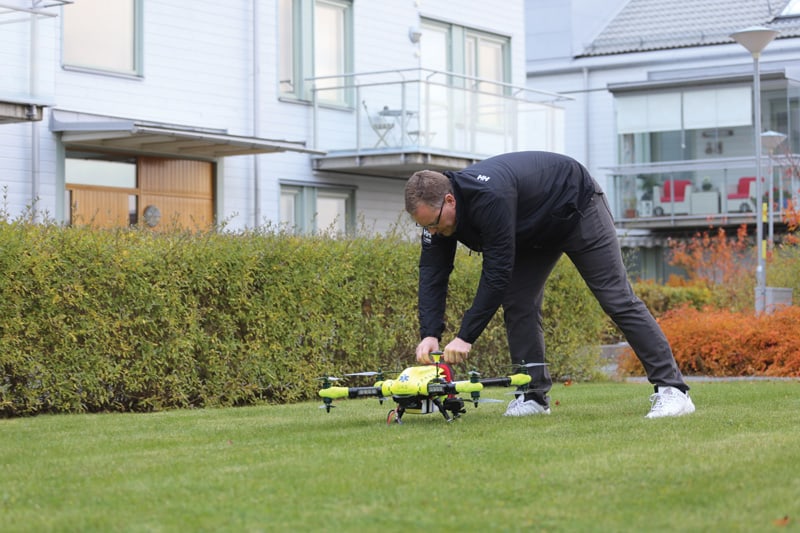 A member of the Karolinska study team testing the AED drone