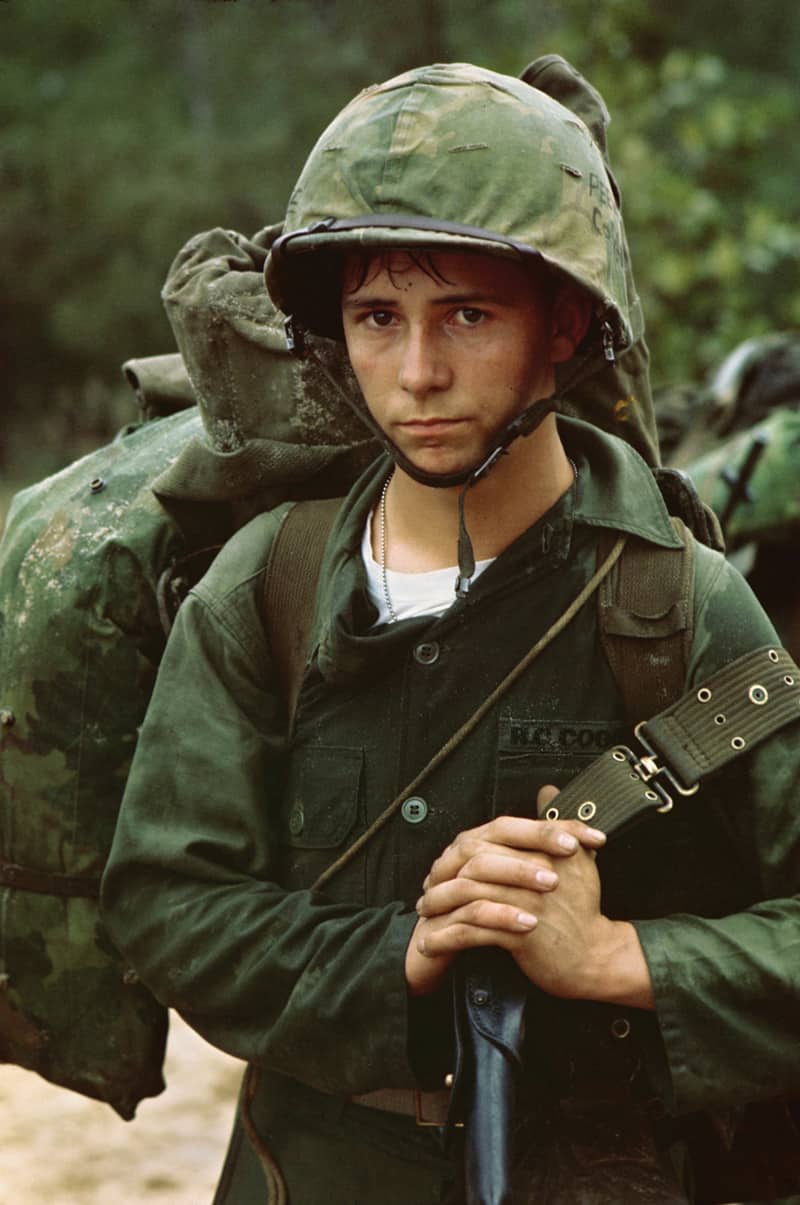 A young Marine private waits on the beach during the Marine landing at Da Nang, Vietnam