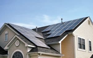 Renewable Green Energy Solar Panels on House Roof Image