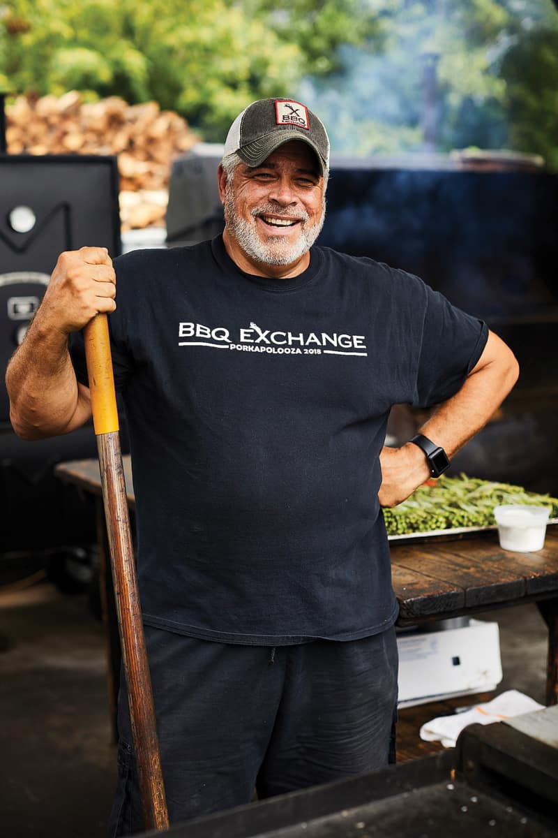 Craig Hartman of Gordonsville's BBQ Exchange doing what he does best