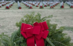 Wreaths Across America decorating veteran graves in holiday wreaths Image