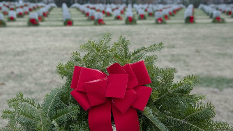 Wreaths Across America decorating veteran graves in holiday wreaths