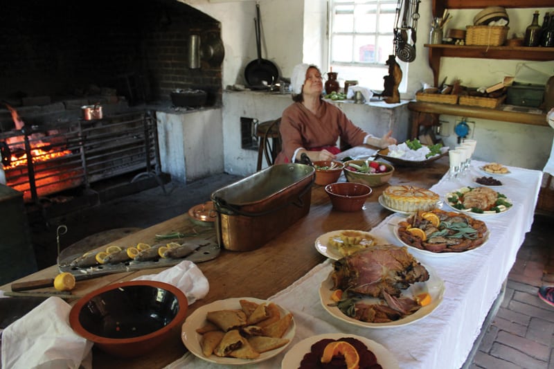 A reenactor from Colonial Williamsburg in the kitchen