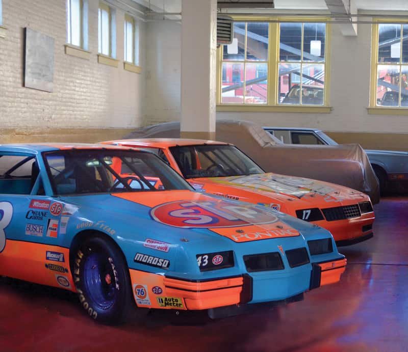 Richard Petty's Pontiac race car and Darrell Waltrip's Chevrolet