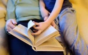 Grandma and grandson are having storytime, it's really cute Image