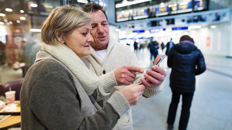 Couple trying to figure out how to use Uber because their friends refuse to pick them up