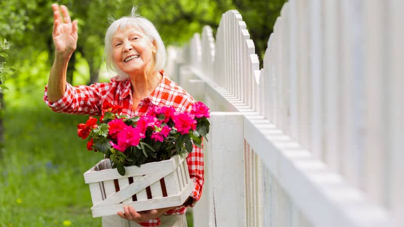 Woman being a good neighbor during the pandemic Image