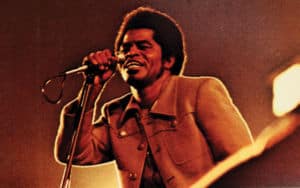 James Brown performing music in the '70s Image