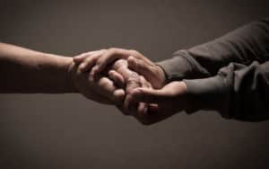 Maurice Dotson holding hands Image