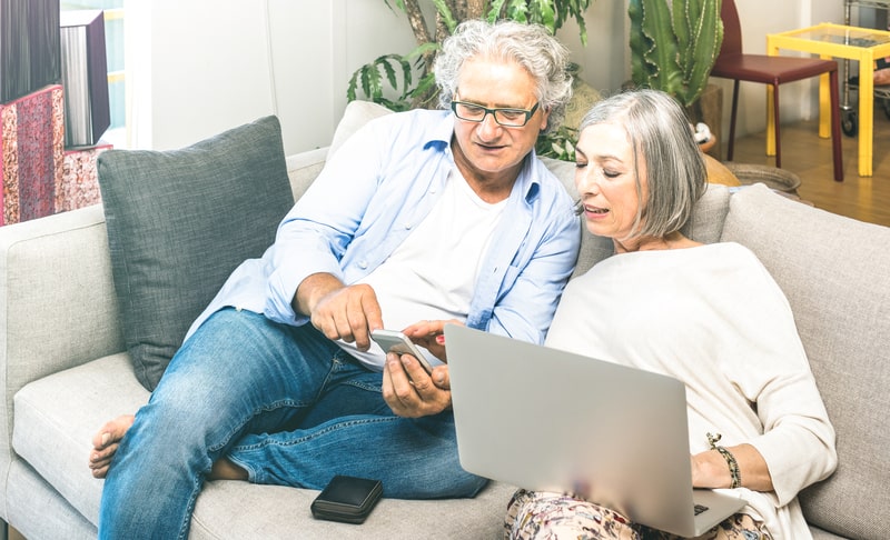 Senior couple learning from home