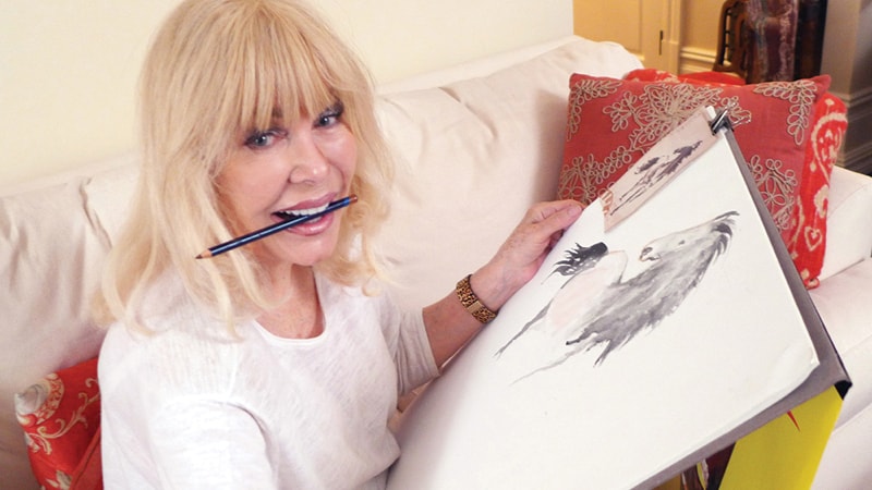 Loretta Swit showing off her art