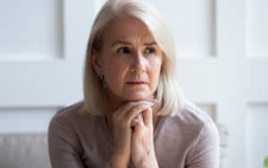 Senior woman knows family secret Image