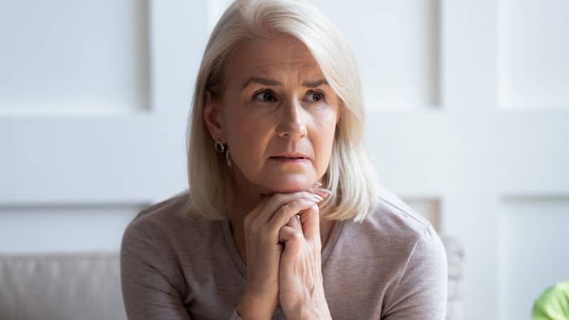Senior woman knows family secret Image