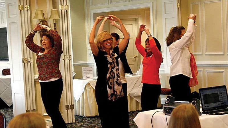 Christine Walters doing some sort of improv exercise Image