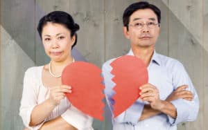 Widow with another man who broke her paper heart Image