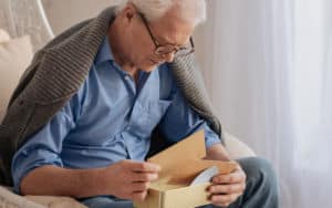 Senior man cannot get over these love letters like wow how sad Image