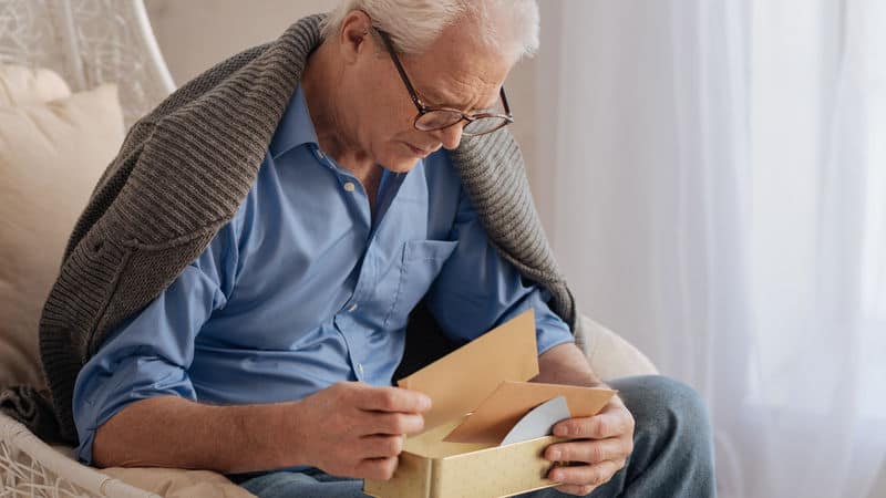 Senior man cannot get over these love letters like wow how sad Image