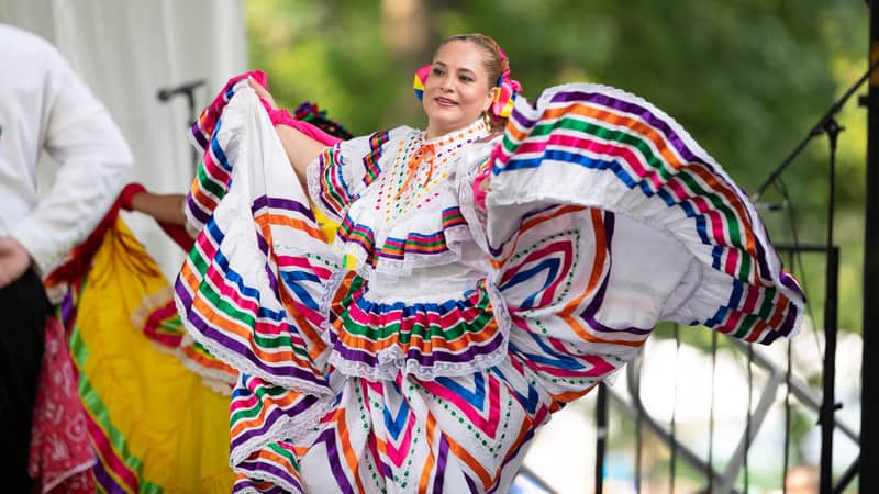 Latina woman at the Cars & Corks event