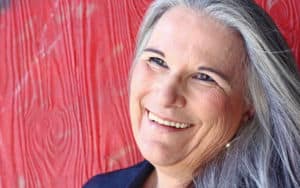 Gray haired woman is a beautiful silver fox Image