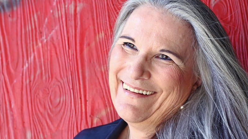 Gray haired woman is a beautiful silver fox