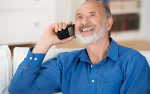 Senior man talking on the phone in Welsh Image