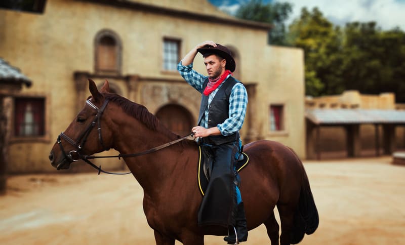 cowboy riding to town