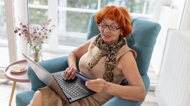 Woman doing some online shopping that gets her into debt