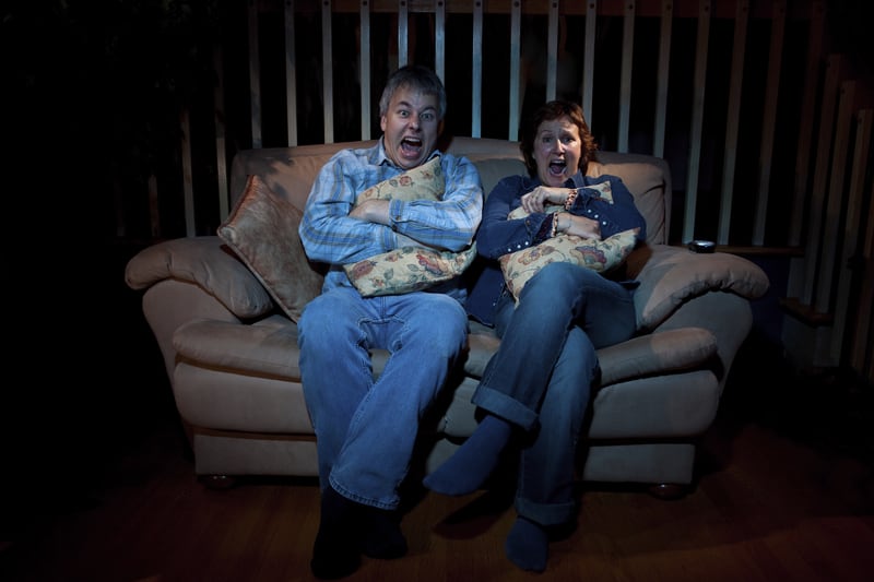Couple watching a scary movie