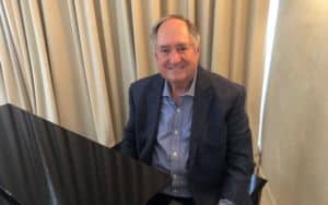 Neil Sedaka at his piano in his Los Angeles home about to record a new mini-concert - provided by Neil Sedaka Image