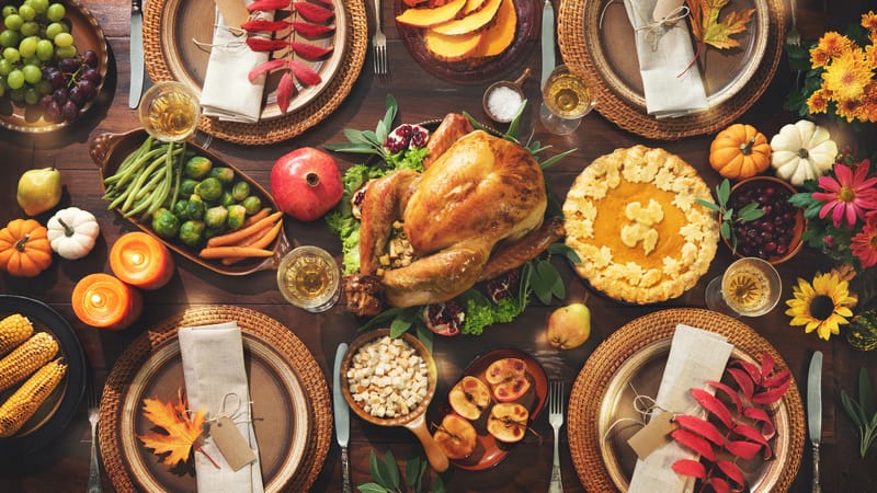 Thanksgiving dishes covering the table