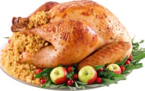 Stuffing Recipes Around the U.S., turkey with cornbread stuffing on a platter Image