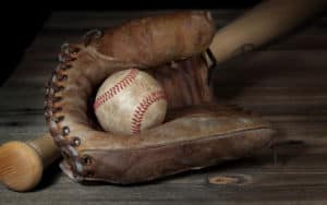 Vintage baseball and bat representing the history of baseball and ballparks in Richmond, Virginia Image