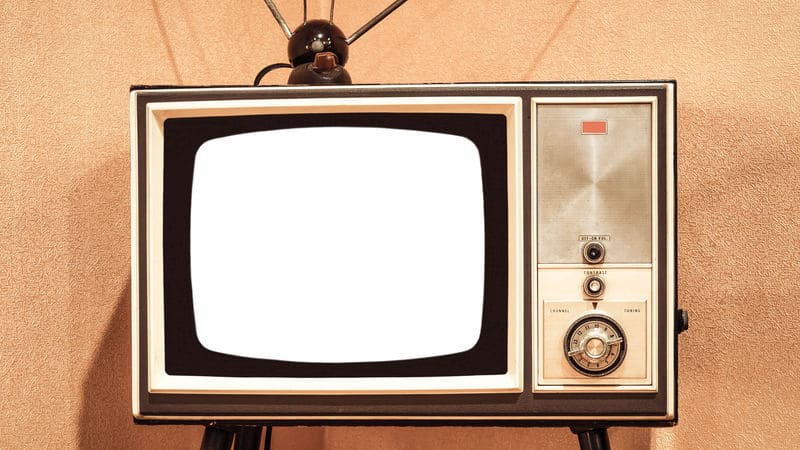 Vintage TV with rabbit ears to promote 10 ad jingles of the 1970s Image