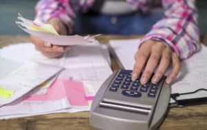 Woman in debt Image