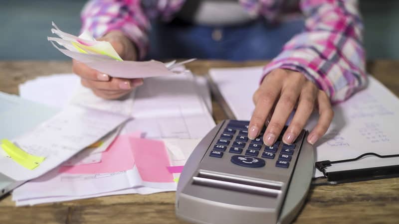 Woman in debt Image