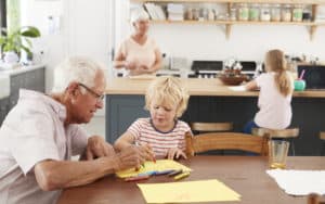 Seniors with grandkids in kitchen for 