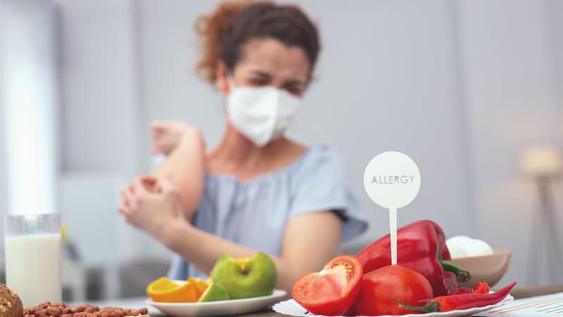 Woman with allergies at a dinner party