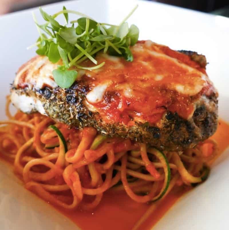 Healthy grilled chicken parmesan over spiral zucchini and whole wheat spaghetti, from Hilton Head Health. For "healthy-eating chicken recipe"