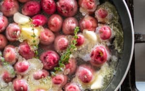 Braised red potatoes with lemon and chives Image