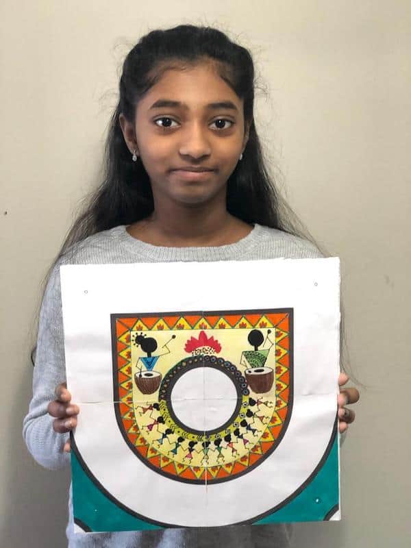 Indian girl with kolam