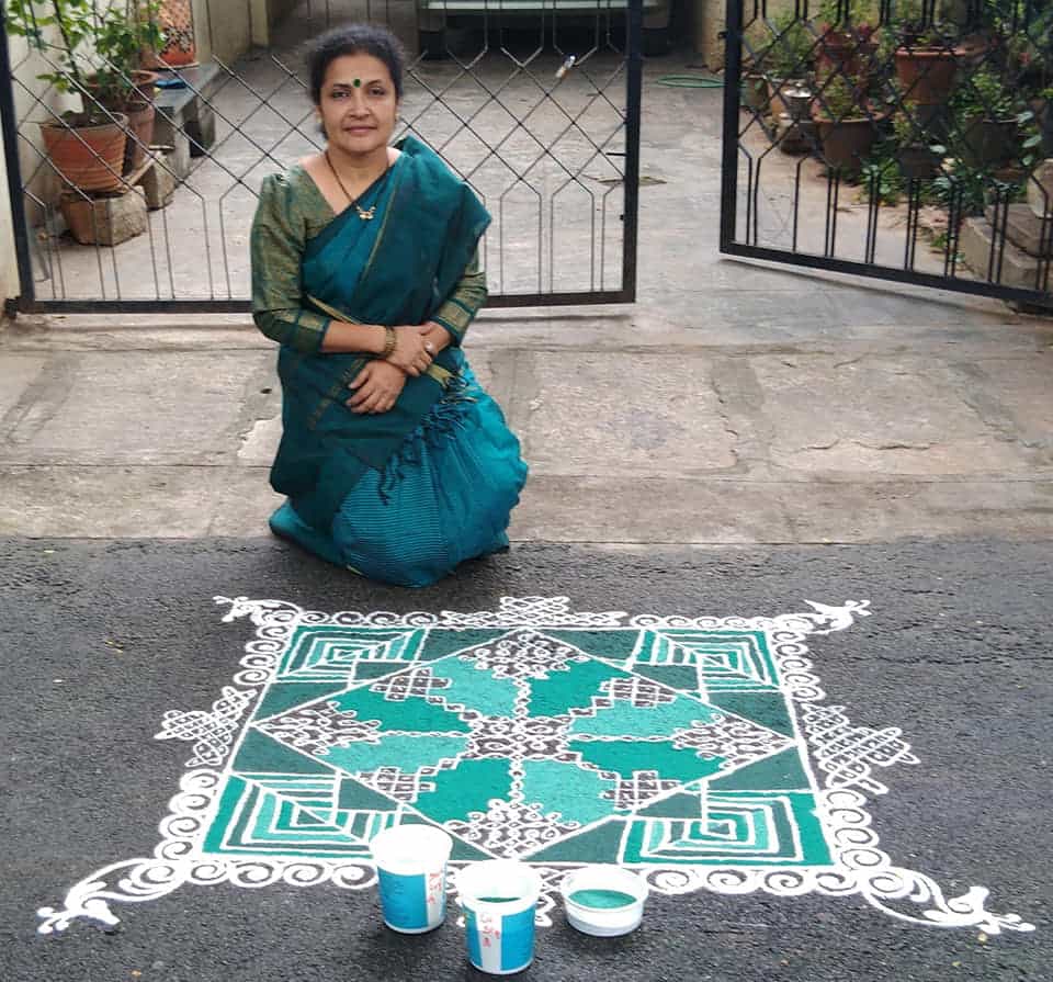 Indian woman with traditional kolam Prathima Dattatreya #1