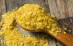 Nutritional yeast on a spoon Image