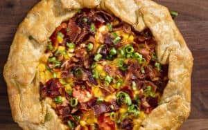 Corn, tomato, and bacon galette recipe Image