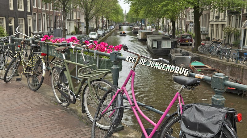 Bikes, Rick Steves' preferred transport through Amsterdam. For Sightseeing and Biking through Amsterdam. Credit: Dominic Arizona Bonuccelli, Rick Steves’ Europe