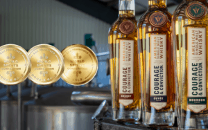 Courage & Conviction cask expressions - three bottles and three awards Image