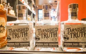Bottles of liquor from Tarnished Truth in the historic Cavalier Hotel Image