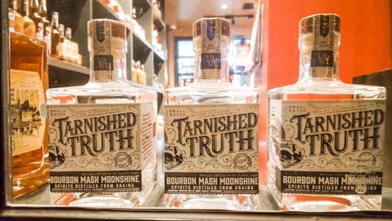 Bottles of liquor from Tarnished Truth in the historic Cavalier Hotel Image